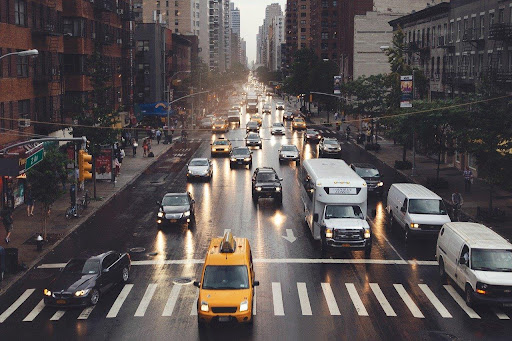busy city street with vehicles driving