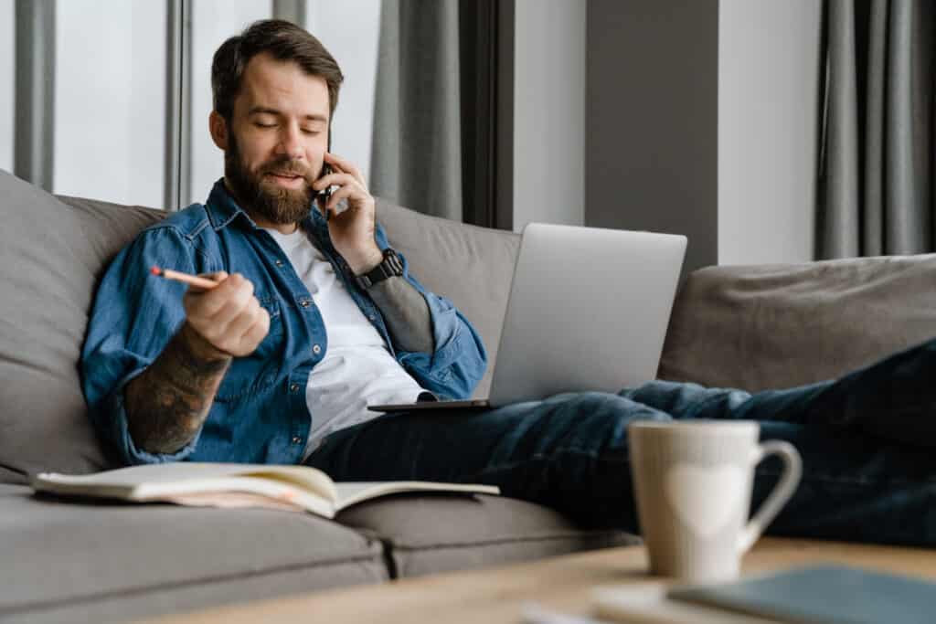 Bearded man getting a quote for adding child to car insurance