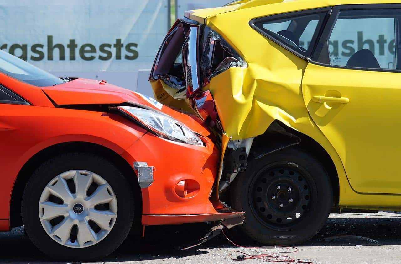 Two cars smashed into one another after a wreck