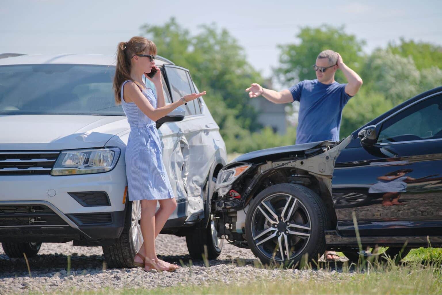 Drivers discussing a car accident and what steps to take next.