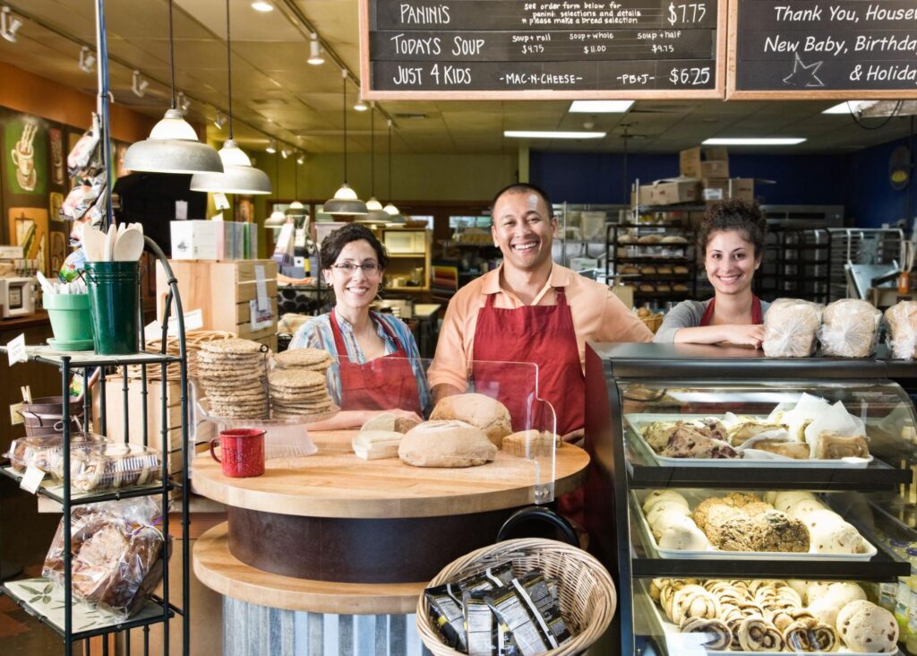 Friendly bakery team ready to serve fresh baked goods and delicious treats.