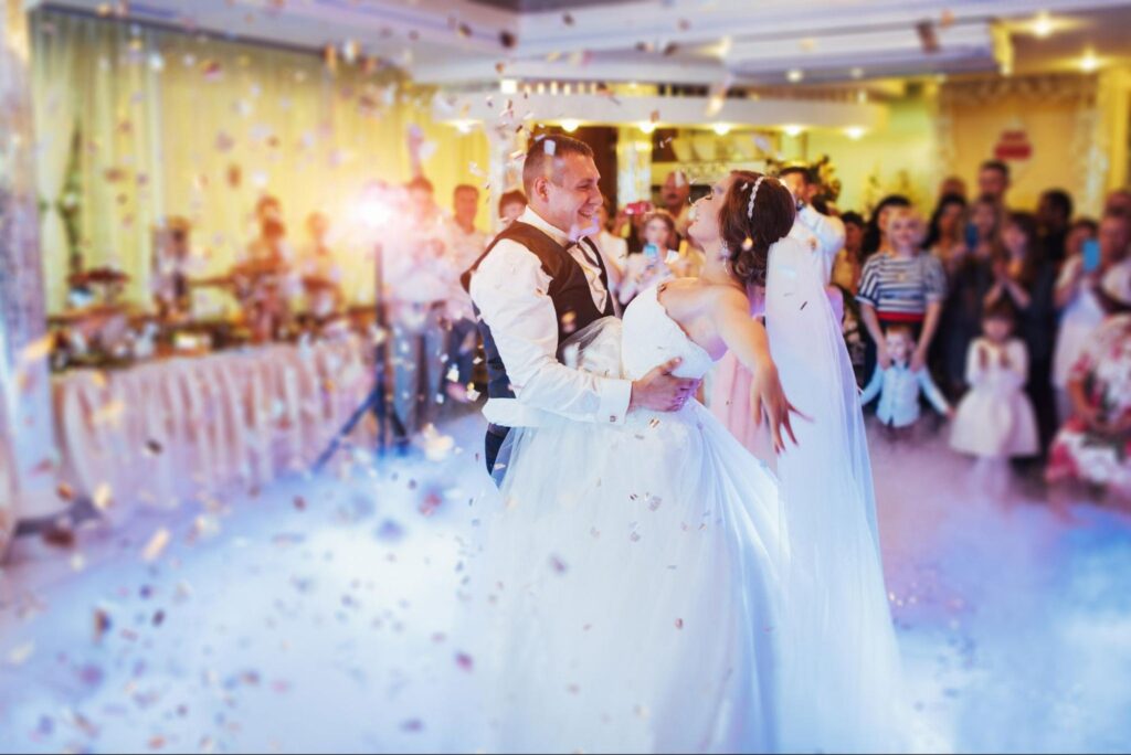 Couple shares a magical first dance at their joyful wedding celebration.